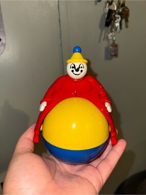 Vintage Rolling Toy in Red, Yellow & Blue - Classic Kids Play Figure